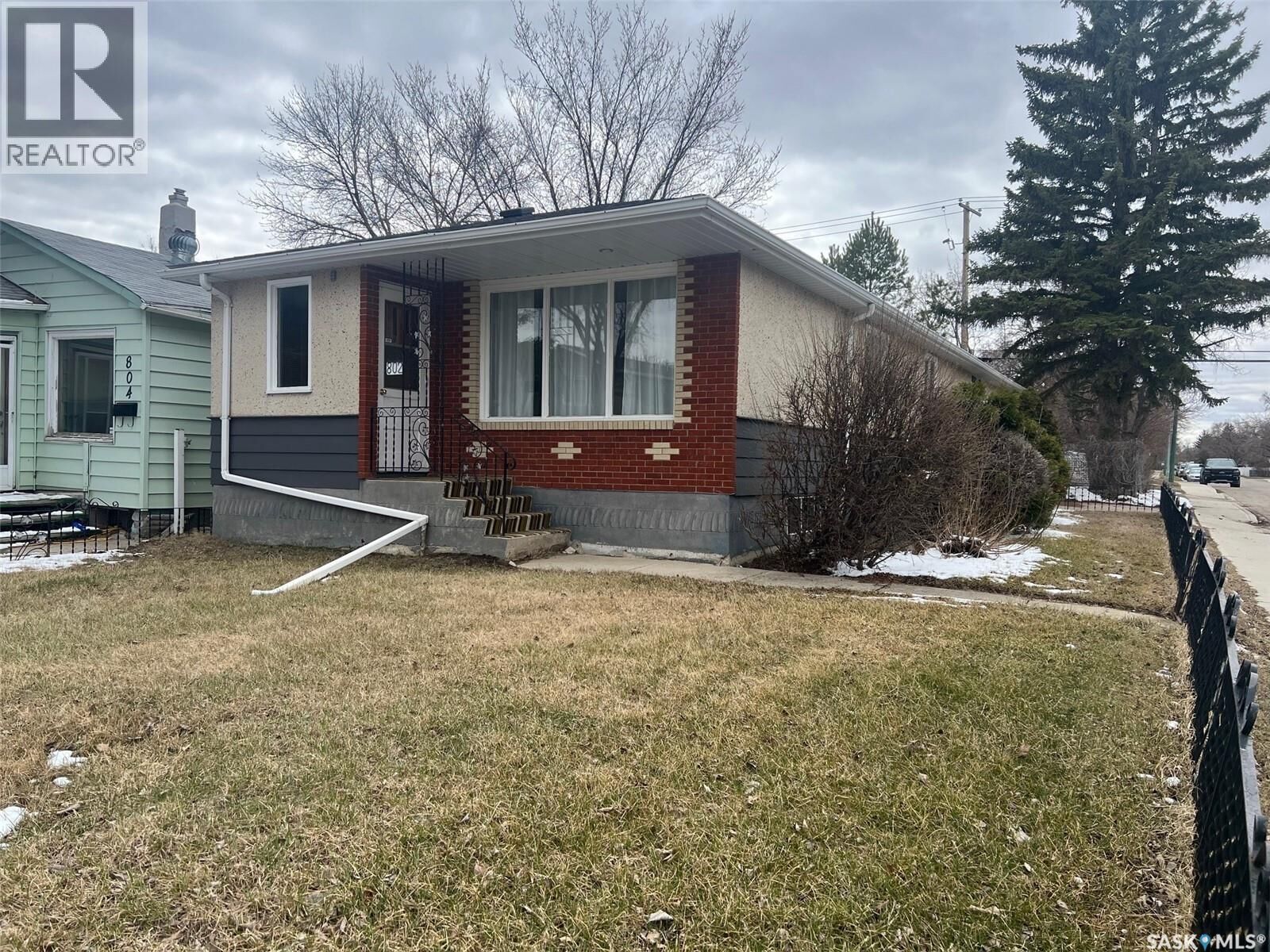 Property Photo:  802 Princess Street  SK S4T 3X9 