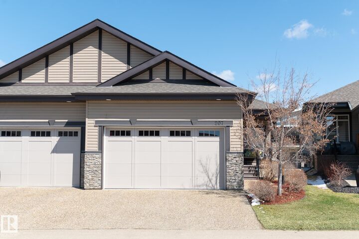 Property Photo: 50 Heatherglen Drive 207 AB T7X 0R6