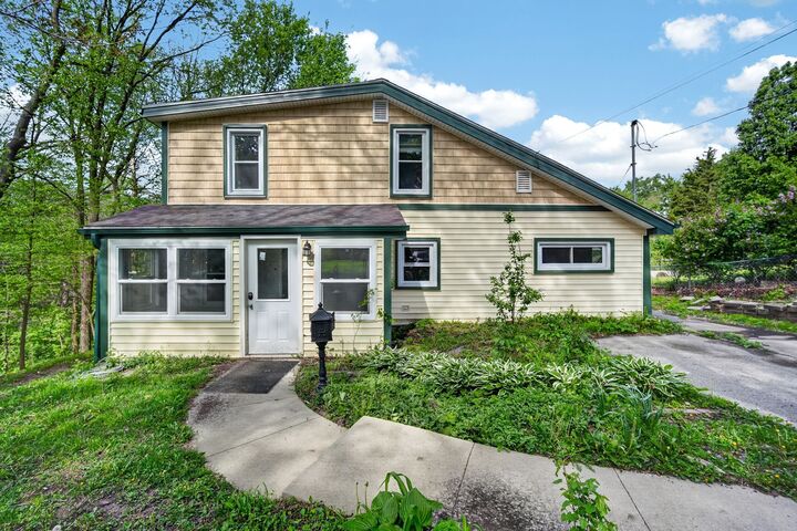 Property Photo:  1328 Merle Hay Road  IA 50311 