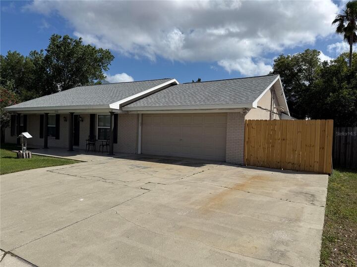 Property Photo:  1410 Saxon Boulevard  FL 32725 