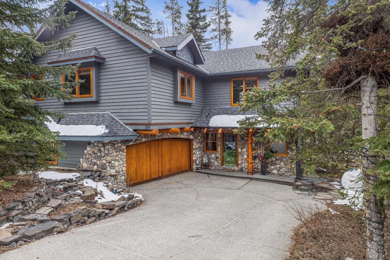 Property Photo: 109 Silvertip Ridge AB T1W 3A8
