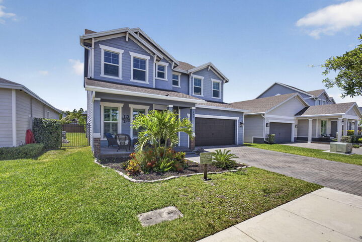 Property Photo:  841 Wandering Willow Way  FL 33470 