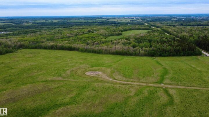 Property Photo:  Twp 492 & RR 83  AB T7A 2A1 