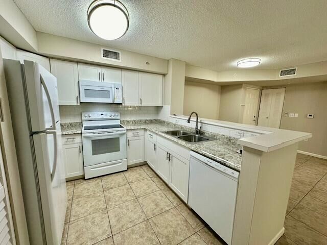 Property Photo:  7840 Sonoma Springs Circle 103  FL 33463 