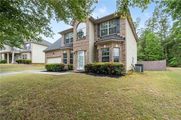 Property Photo:  304 Allegrini Drive  GA 30349 