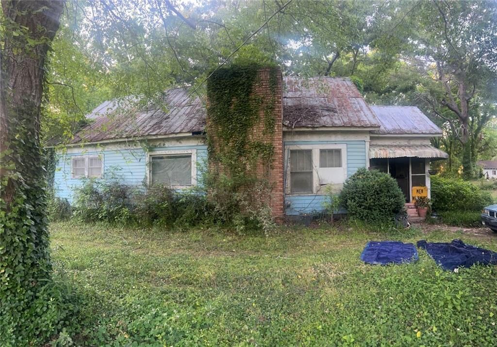 Property Photo:  5884 Rockbridge Road  GA 30087 