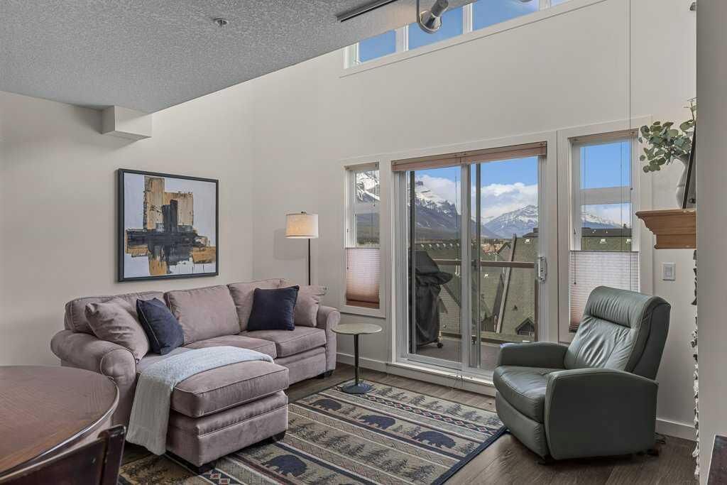 Property Photo: 160 Kananaskis Way 406 AB T1W 3E2