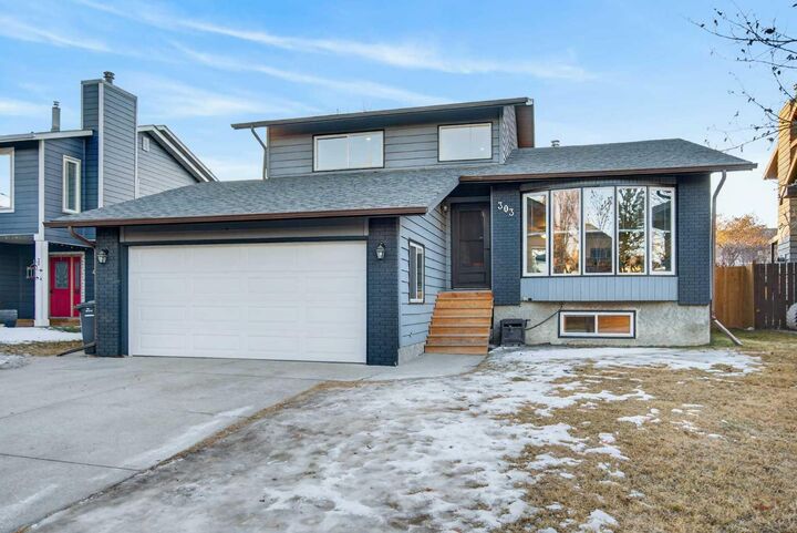 Property Photo:  303 Woodside Place  AB T1S 1L9 