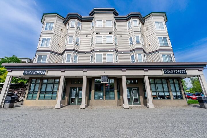 Property Photo: 5765 Glover Road 101 BC V3A 8M8