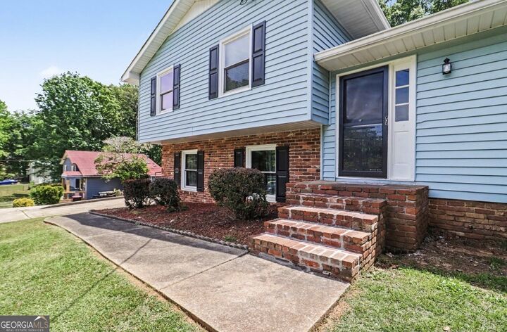 Property Photo:  5913 Old Forrest Way  GA 30135 