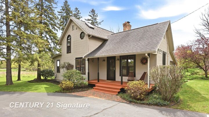 Property Photo:  4815 N Hemlock Road  MI 48626 