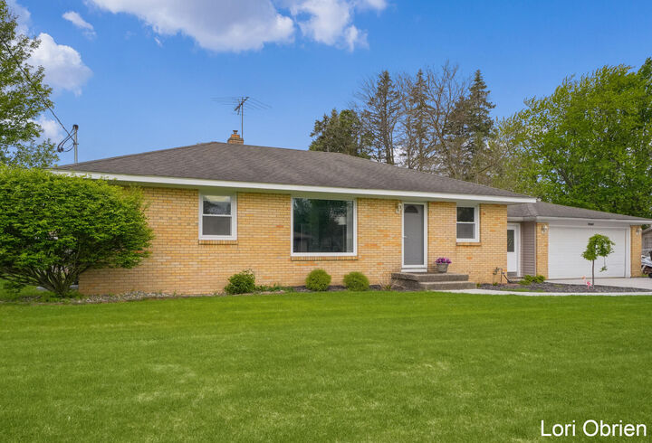 Property Photo:  7487 Lupine Avenue  MI 49428 