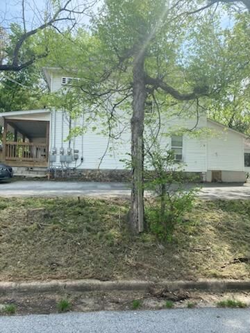 Property Photo:  124 Rogers E  AR 72601 