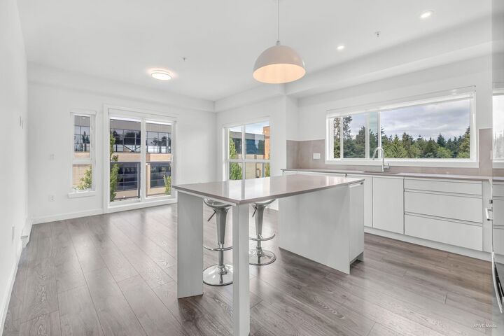 Property Photo: 14225 103A Avenue 401 BC V3T 0T4