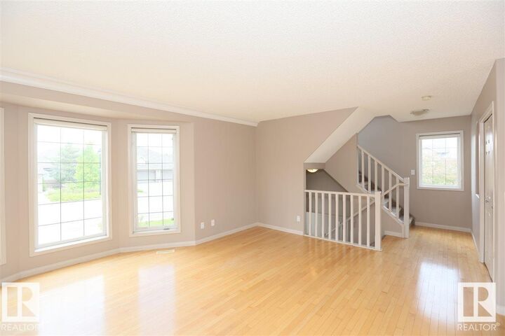 Property Photo:  10903 8 Avenue SW  AB T6W 1G1 