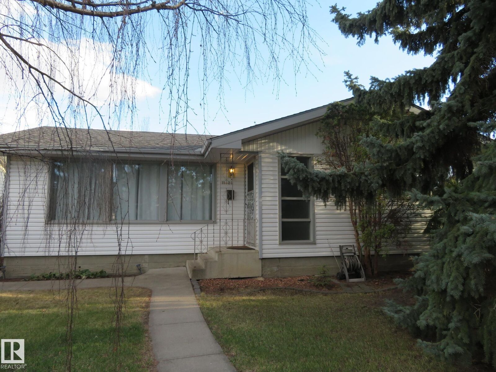 Property Photo:  11423 50 Avenue NW  AB T6E 2J4 