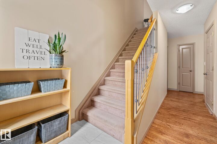 Property Photo:  15 Woodsmere Close 7  AB T8L 4S2 