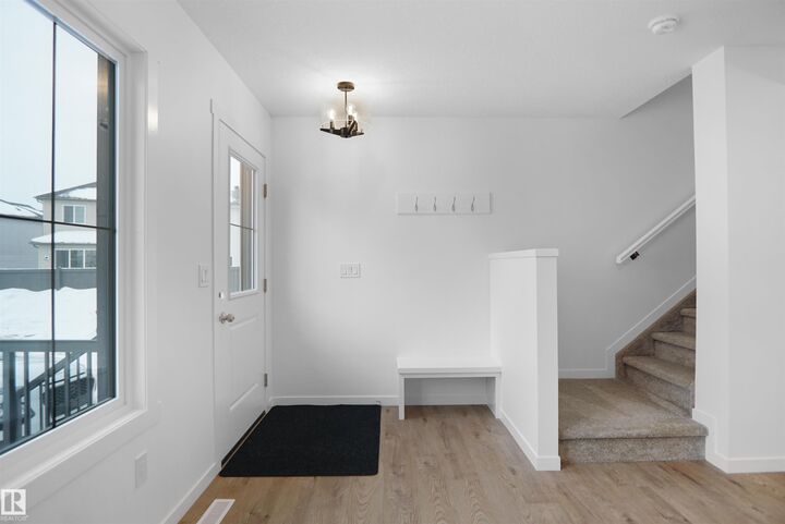 Property Photo:  1009 Cy Becker Road NW 111  AB T5Y 4B7 