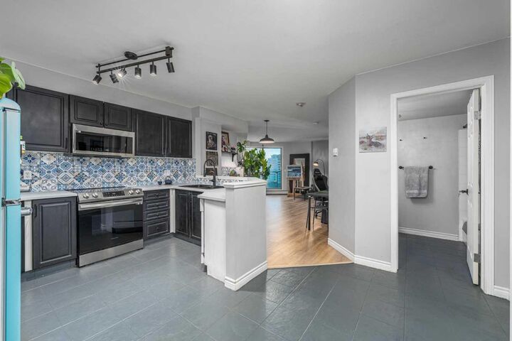 Property Photo:  1121 6 Avenue SW 1004  AB T2P 5J4 