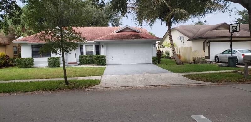 Property Photo:  9555 NW 25th Court  FL 33065 