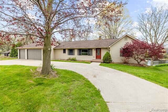Property Photo:  235 Indianwood Road  MI 48362 