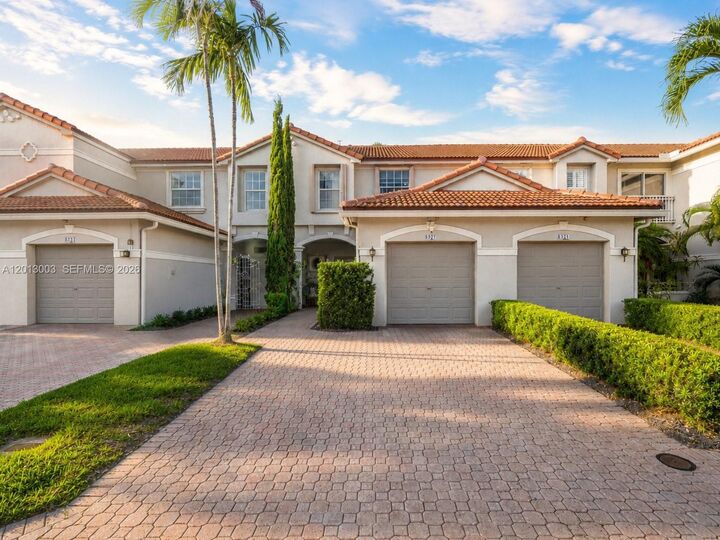 Property Photo:  8327 Via Leonessa  FL 33433 