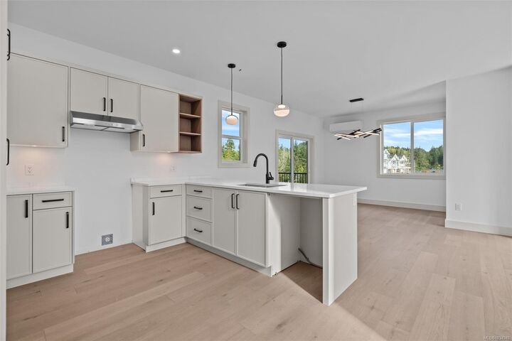 Property Photo: 571 Bezanton Way #1 BC V9C 0H2