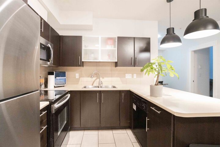 Property Photo:  33545 Rainbow Avenue 210  BC V2S 0B9 