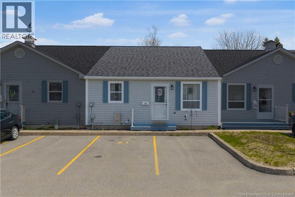 Property Photo:  21 Blue Herron Park  NB E2M 5L7 