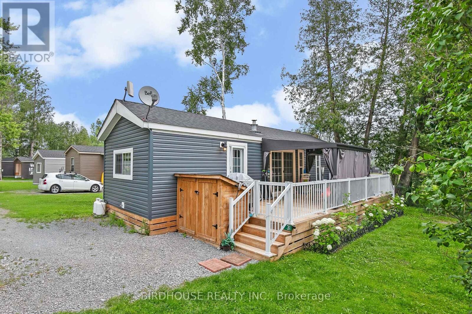 Property Photo:  657 Thunderbridge Road 31  ON K9V 4R1 