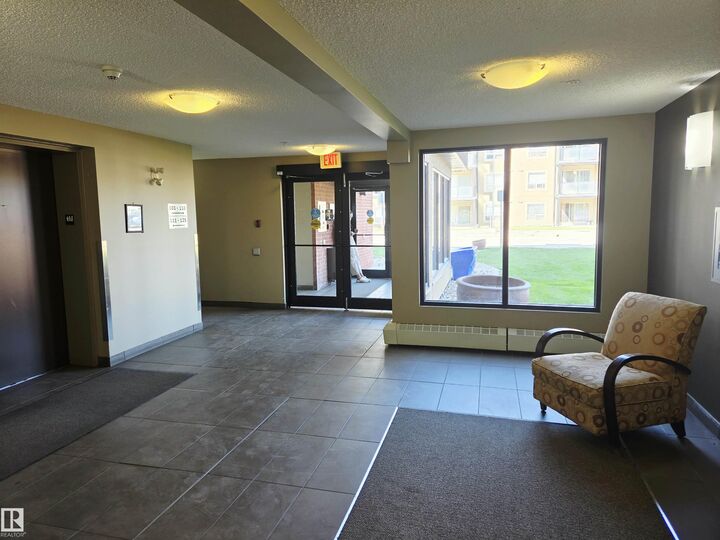 Property Photo:  13907 136 Street NW 423  AB T6V 1Y5 
