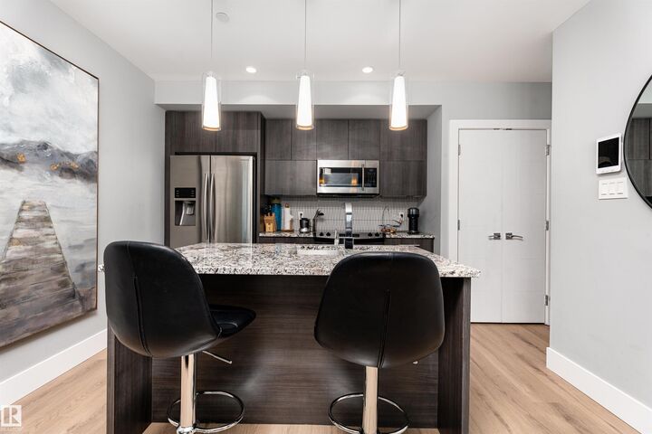 Property Photo:  11969 Jasper Avenue NW 1404  AB T5K 0P1 