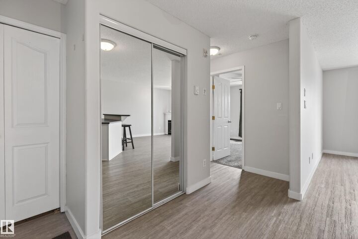 Property Photo:  16303 95 Street NW 319  AB T5Z 3V1 