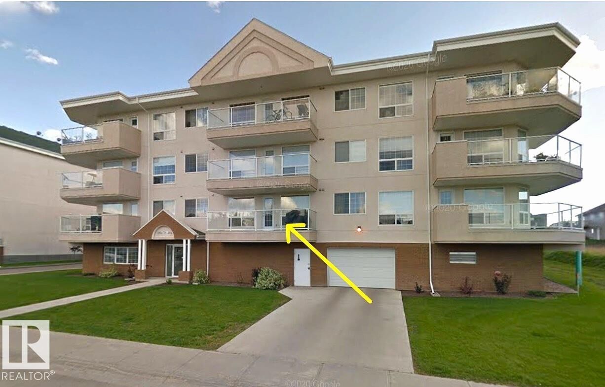 Property Photo:  1705 7 Avenue 102  AB T9M 9A6 