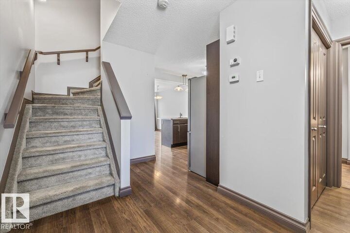Property Photo:  2005 70 Street SW 50  AB T6X 0T9 