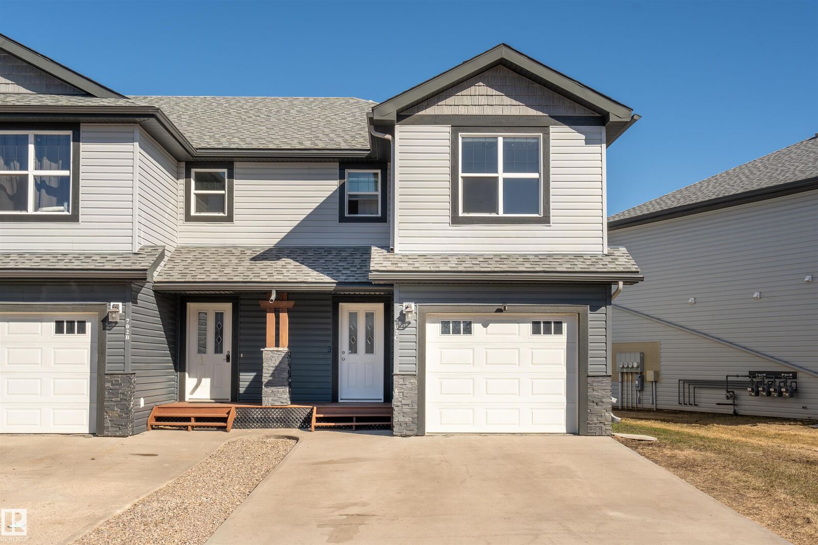 Property Photo:  702C Rocky Way  AB T9M 0H3 