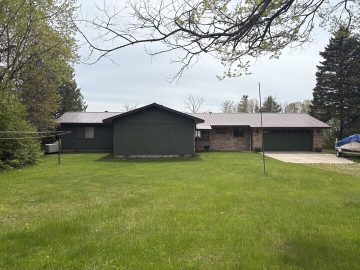 Property Photo: W11991 Middle Beach Rd MI 49762