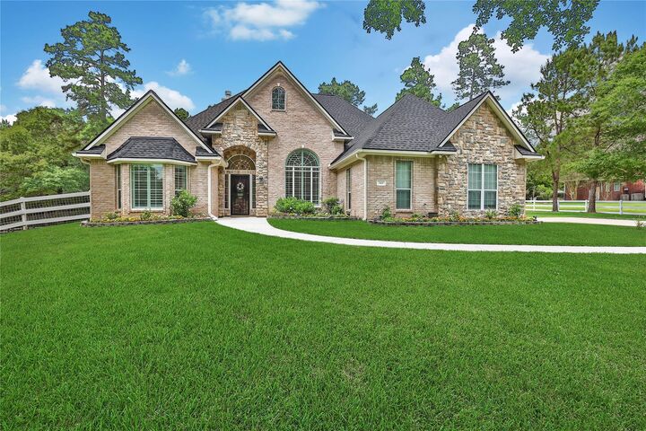 Property Photo:  345 Ridgelake Scenic Drive  TX 77316 