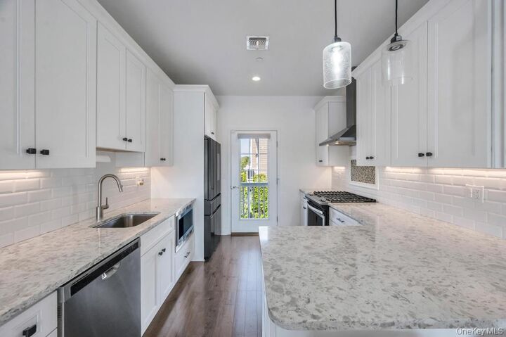 Property Photo:  18 Hearthstone Court  NY 11735 