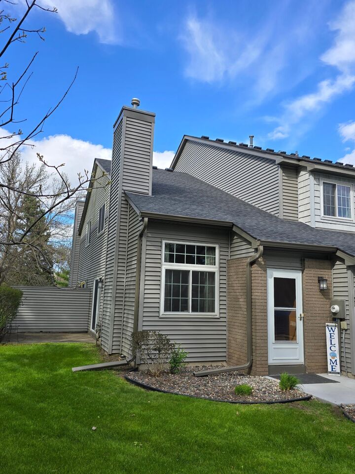 Property Photo: 9935 Russell Avenue N 7 MN 55444