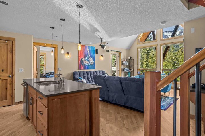 Property Photo:  2100A Stewart Creek Drive 302  AB T1W 0G3 