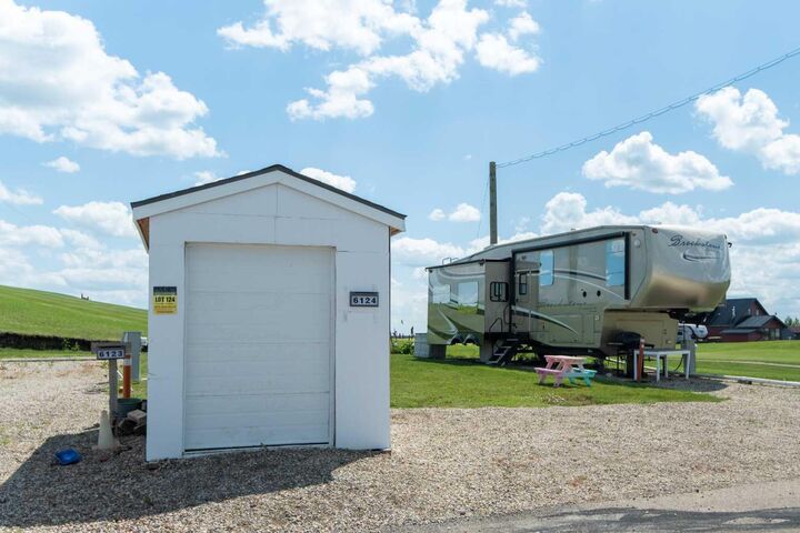 Property Photo:  25054 South Pine Lake Road 6124  AB T0M 1R0 