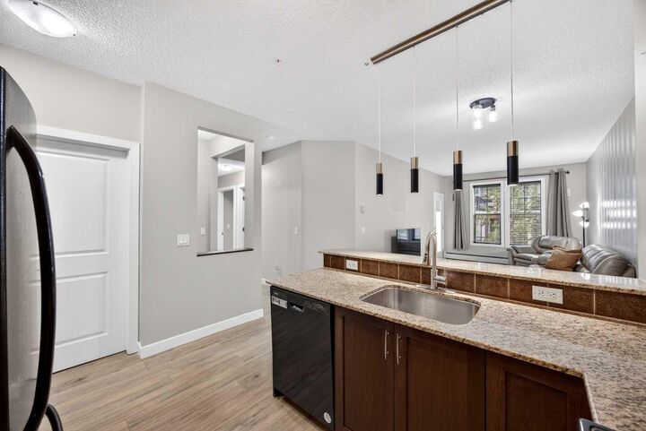 Property Photo:  201 Sunset Drive 206  AB T4C 0H5 