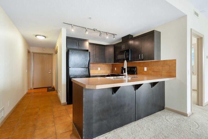 Property Photo:  1410 1 Street SE 610  AB T2G 5T7 