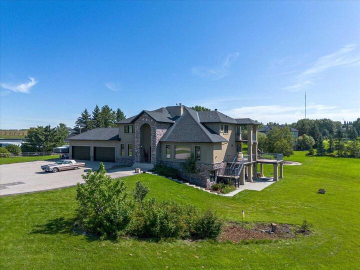 Property Photo:  244094 Partridge Place  AB T3Z 3M2 
