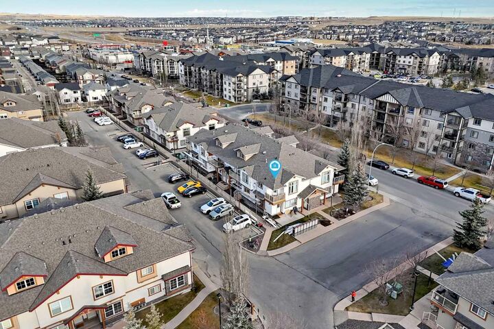 Property Photo:  20 Panatella Landing NW 205  AB T3K 0K8 