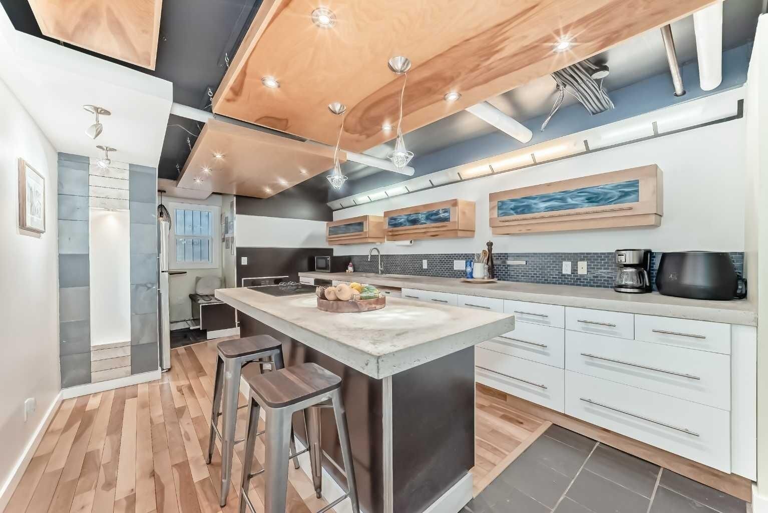 Property Photo:  128 15 Avenue SW 101  AB T2R 0P5 