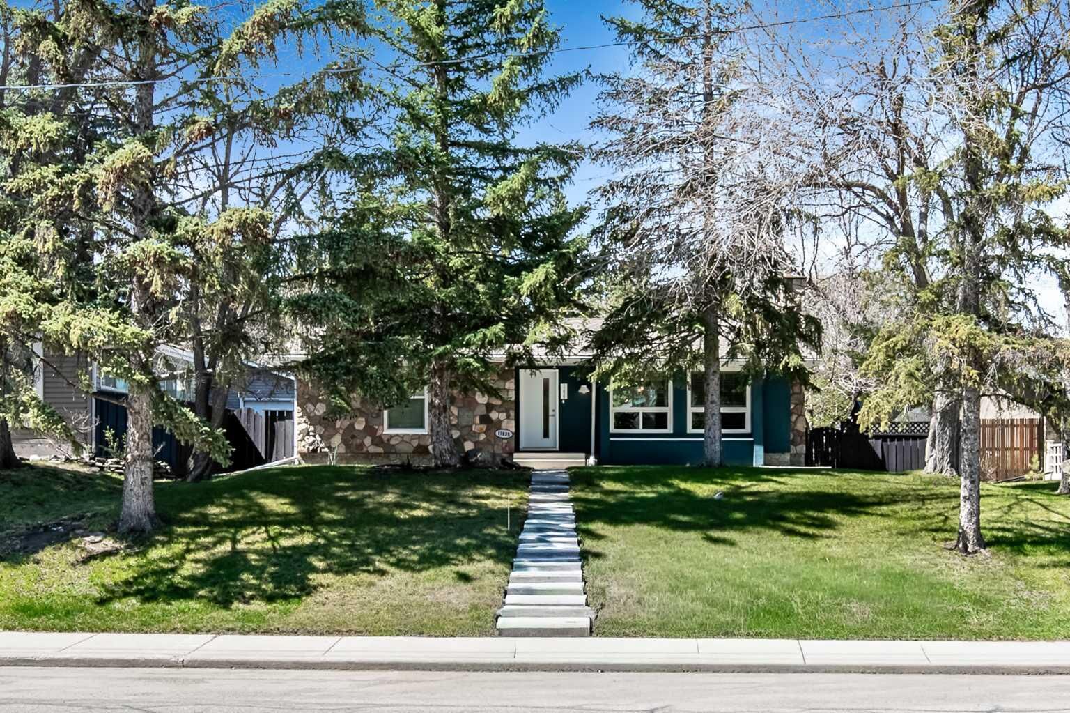 Property Photo:  11835 Elbow Drive SW  AB T2W 1H1 