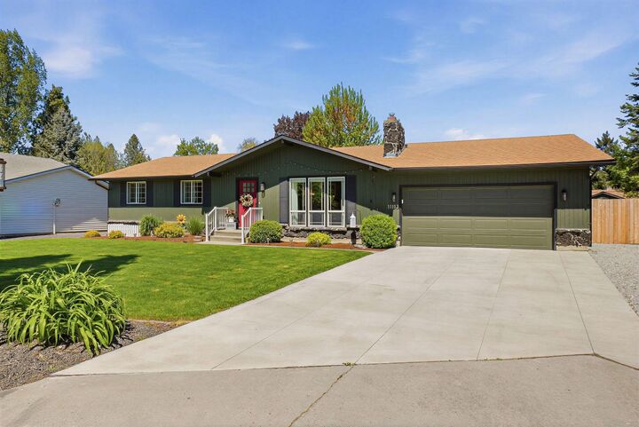 Property Photo:  11113 E 38th Ave  WA 99206 
