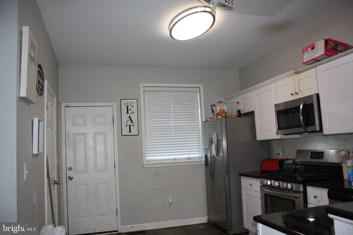 Property Photo:  4830 Pimlico Road  MD 21215 
